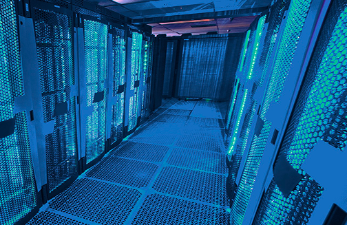 Data center server racks lit in blue